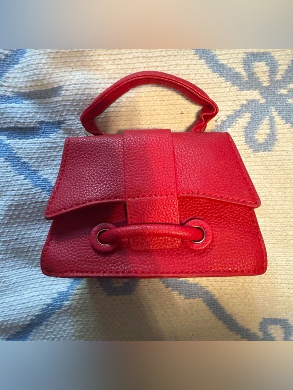 Compact Red Mini Top-Handle Bag with Front Strap Detail